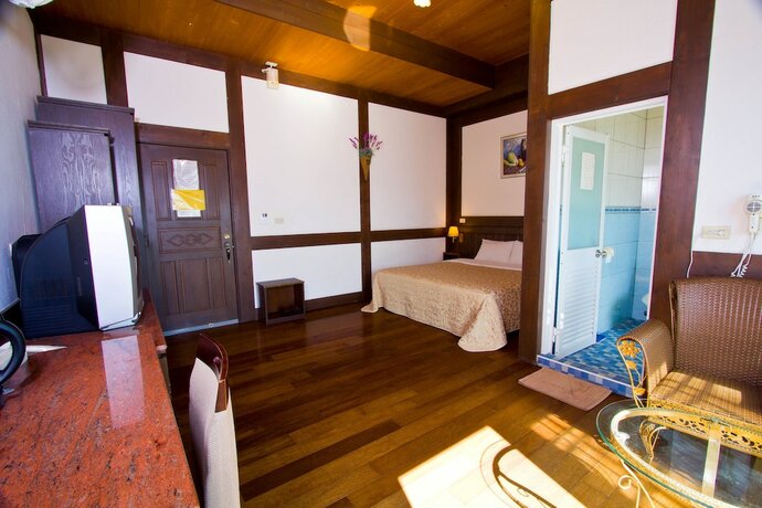 Imagen de la habitación del Hotel Maple Leaf Holiday Villa. Foto 20