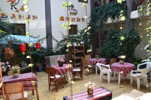 Imagen de la habitación del Hotel Maple Leaf Inn, Lijiang. Foto 2