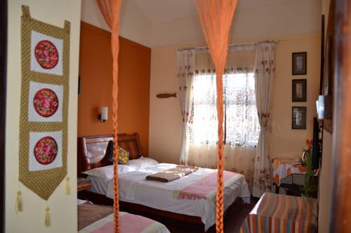 Imagen de la habitación del Hotel Maple Leaf Inn, Lijiang. Foto 6