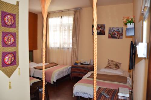 Imagen de la habitación del Hotel Maple Leaf Inn, Lijiang. Foto 12