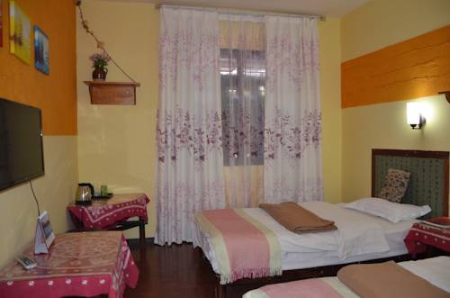 Imagen de la habitación del Hotel Maple Leaf Inn, Lijiang. Foto 15