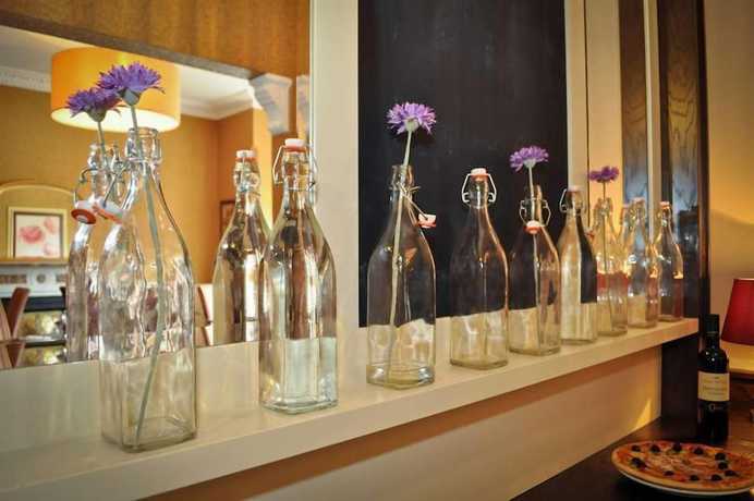 Imagen del bar/restaurante del Hotel Maples House. Foto 4