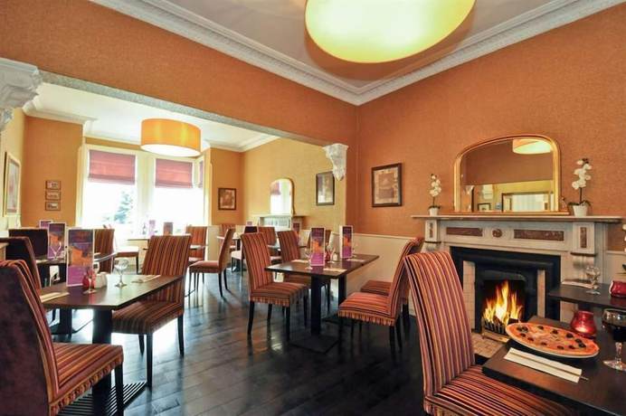 Imagen del bar/restaurante del Hotel Maples House. Foto 7