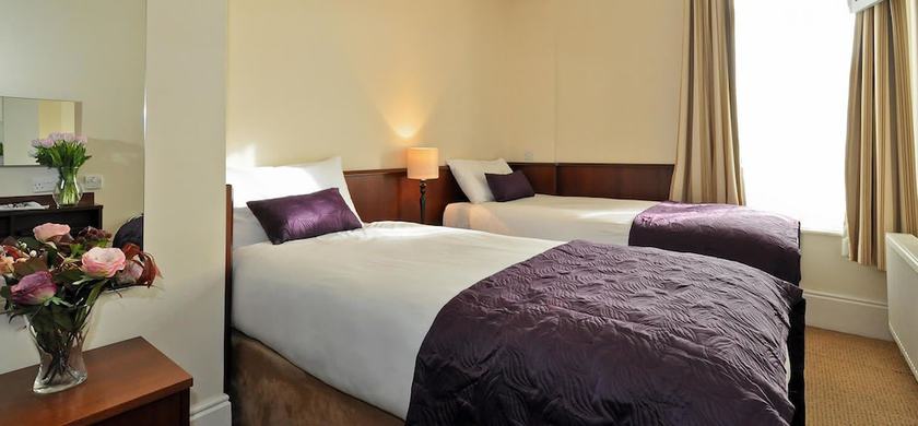 Imagen de la habitación del Hotel Maples House. Foto 12