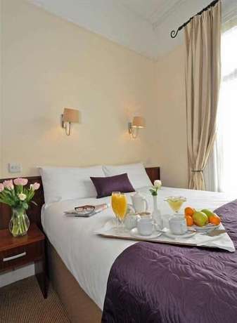 Imagen de la habitación del Hotel Maples House. Foto 13