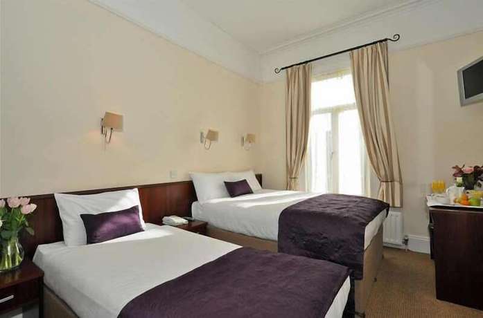 Imagen de la habitación del Hotel Maples House. Foto 14