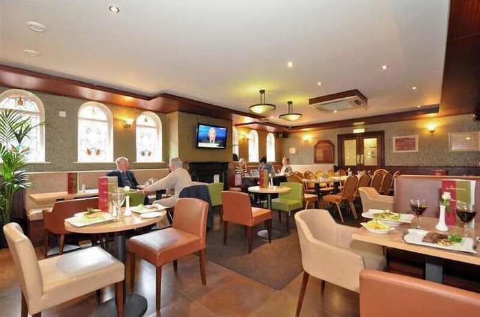 Imagen del bar/restaurante del Hotel Maples House. Foto 8