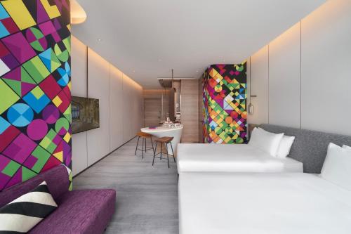 Imagen de la habitación del Hotel Maqo Changsha. Foto 14