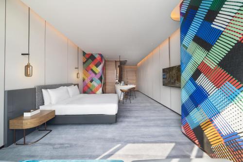 Imagen de la habitación del Hotel Maqo Changsha. Foto 15