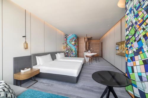 Imagen de la habitación del Hotel Maqo Changsha. Foto 17