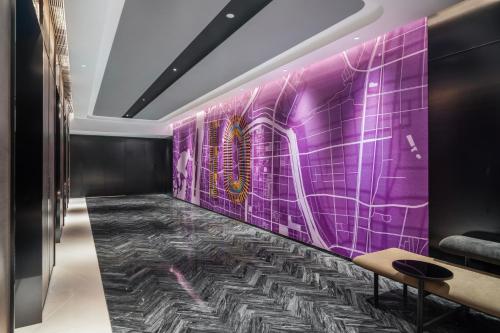 Imagen de la habitación del Hotel Maqo Changsha. Foto 19