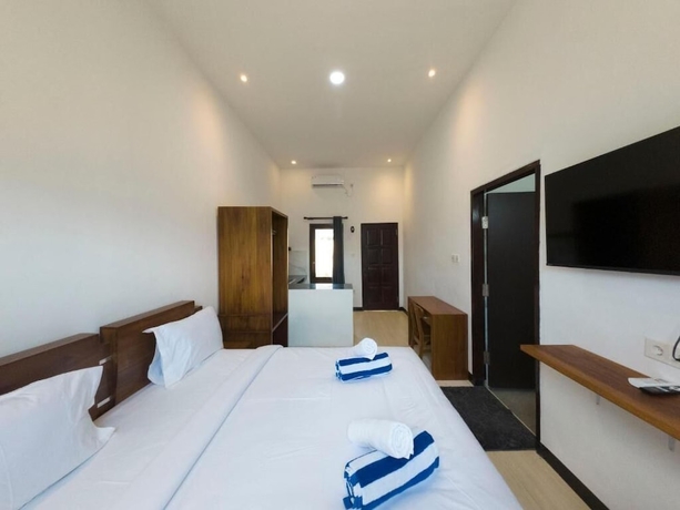 Imagen de la habitación del Hotel Mar Bella Beachfront. Foto 2