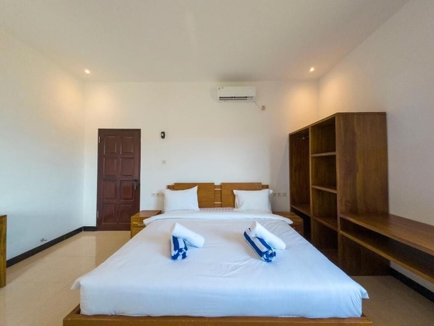 Imagen de la habitación del Hotel Mar Bella Beachfront. Foto 4