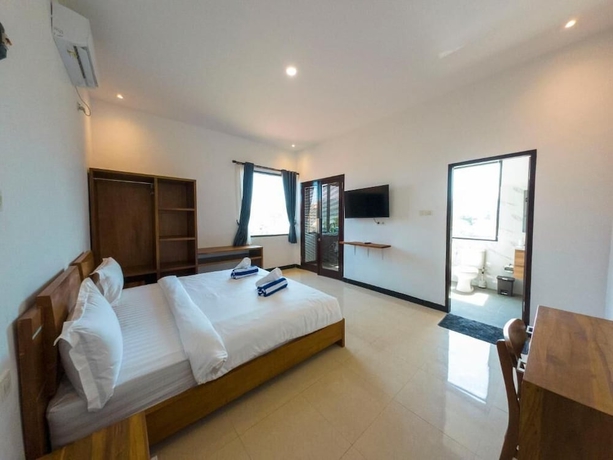 Imagen de la habitación del Hotel Mar Bella Beachfront. Foto 5