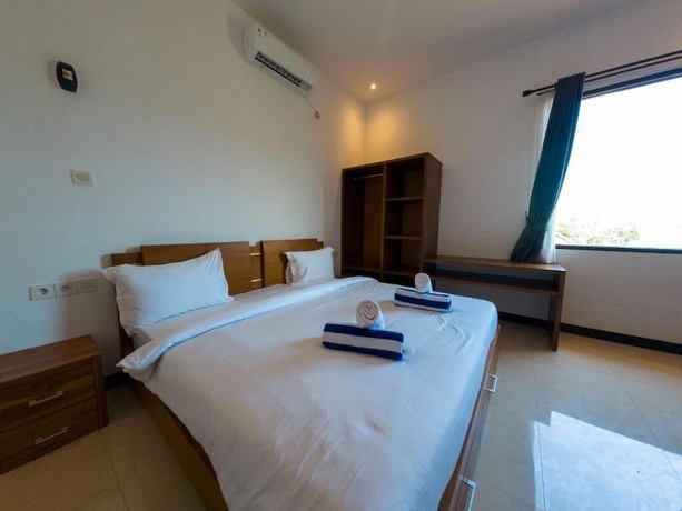 Imagen de la habitación del Hotel Mar Bella Beachfront. Foto 6