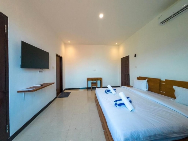 Imagen de la habitación del Hotel Mar Bella Beachfront. Foto 9