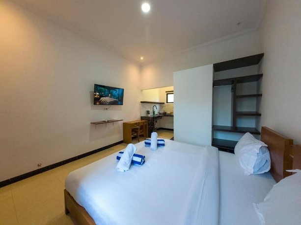 Imagen de la habitación del Hotel Mar Bella Beachfront. Foto 10