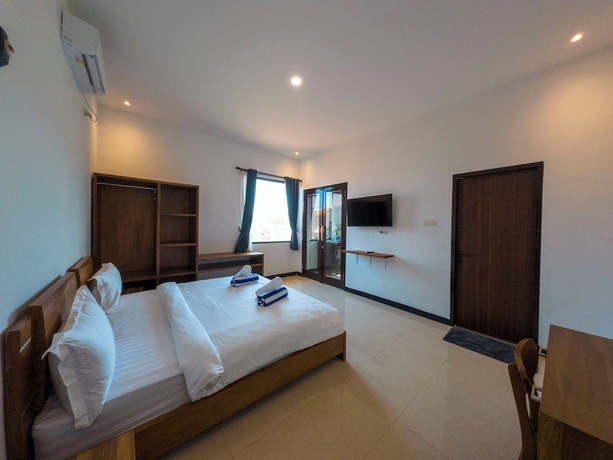 Imagen de la habitación del Hotel Mar Bella Beachfront. Foto 11