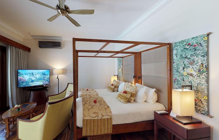 Imagen de la habitación del Hotel Maradiva Villas Resort and Spa. Foto 12