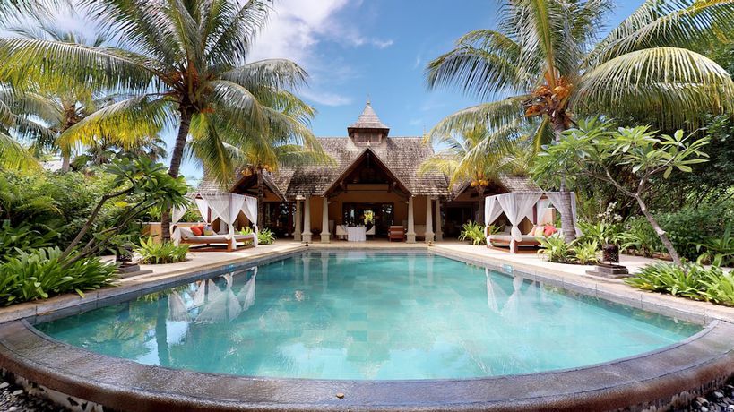 Imagen de la habitación del Hotel Maradiva Villas Resort and Spa. Foto 16