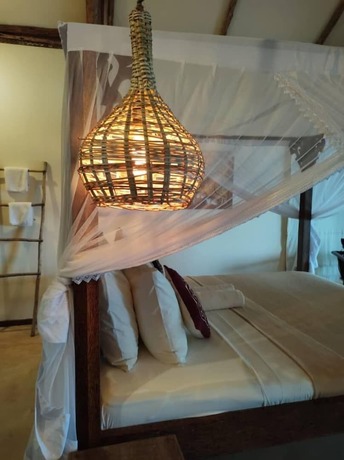 Imagen de la habitación del Hotel Marafiki Bungalows. Foto 11
