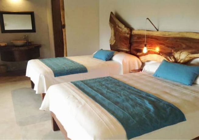 Imagen de la habitación del Hotel Maraica San Pancho Rooms. Foto 11