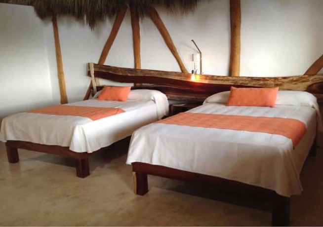 Imagen de la habitación del Hotel Maraica San Pancho Rooms. Foto 15