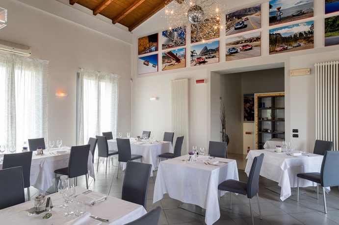 Imagen del bar/restaurante del Hotel Maranello Village. Foto 5