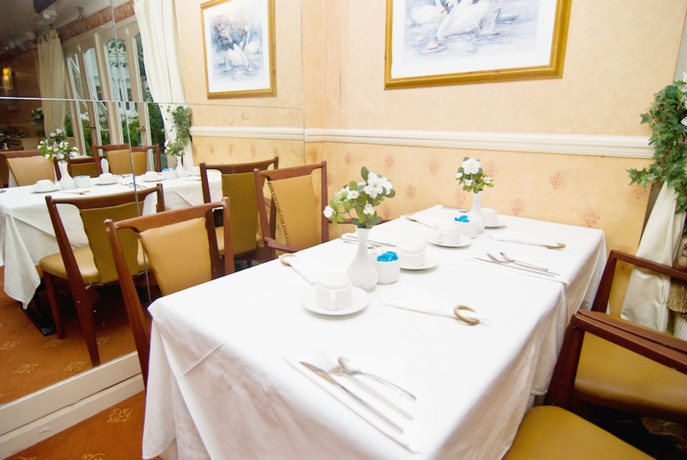 Imagen del bar/restaurante del Hotel Maranton House. Foto 3