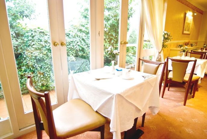 Imagen del bar/restaurante del Hotel Maranton House. Foto 4