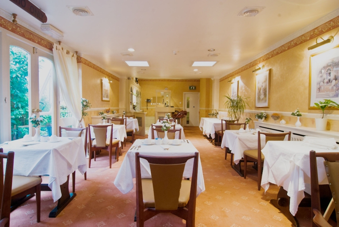 Imagen del bar/restaurante del Hotel Maranton House. Foto 5