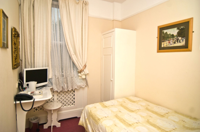 Imagen de la habitación del Hotel Maranton House. Foto 8