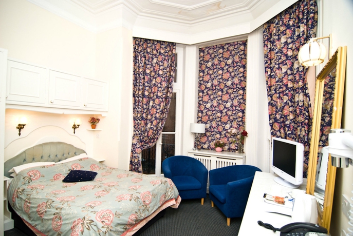 Imagen de la habitación del Hotel Maranton House. Foto 9