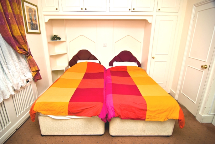 Imagen de la habitación del Hotel Maranton House. Foto 10