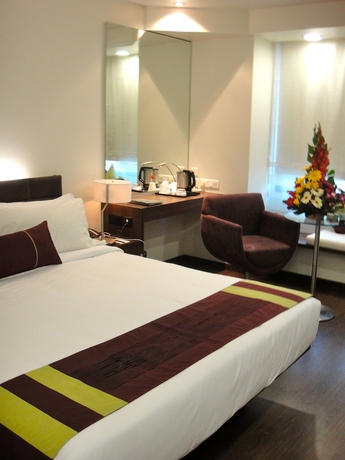 Imagen de la habitación del Hotel Marasa Sarovar Portico Rajkot. Foto 2