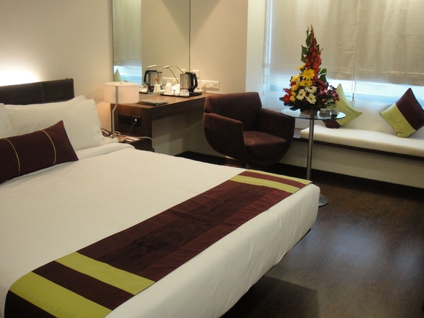 Imagen de la habitación del Hotel Marasa Sarovar Portico Rajkot. Foto 3