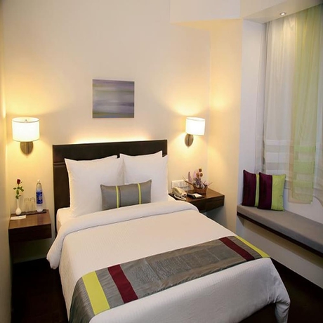 Imagen de la habitación del Hotel Marasa Sarovar Portico Rajkot. Foto 4