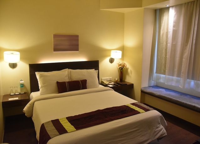 Imagen de la habitación del Hotel Marasa Sarovar Portico Rajkot. Foto 5