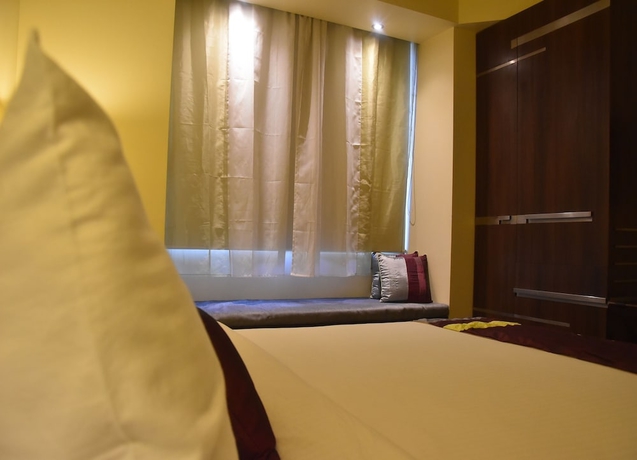 Imagen de la habitación del Hotel Marasa Sarovar Portico Rajkot. Foto 6