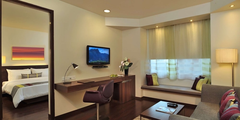 Imagen de la habitación del Hotel Marasa Sarovar Portico Rajkot. Foto 8