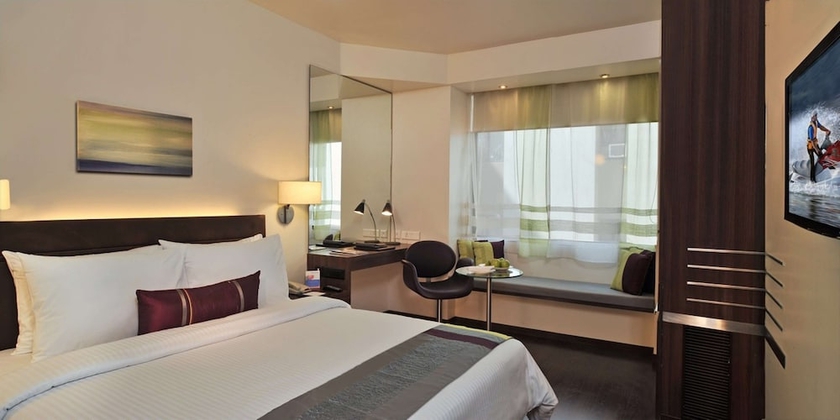 Imagen de la habitación del Hotel Marasa Sarovar Portico Rajkot. Foto 10