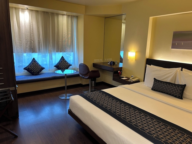 Imagen de la habitación del Hotel Marasa Sarovar Portico Rajkot. Foto 12