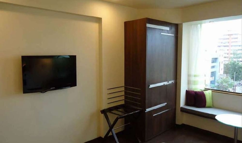Imagen de la habitación del Hotel Marasa Sarovar Portico Rajkot. Foto 13