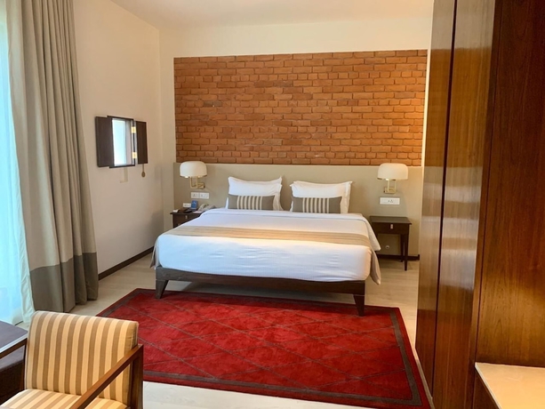 Imagen de la habitación del Hotel Marasa Sarovar Premiere Bodhgaya. Foto 3