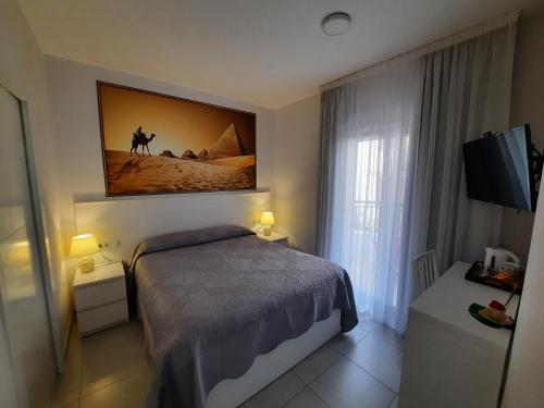 Imagen de la habitación del Hotel Maravillas del Mundo. Foto 12