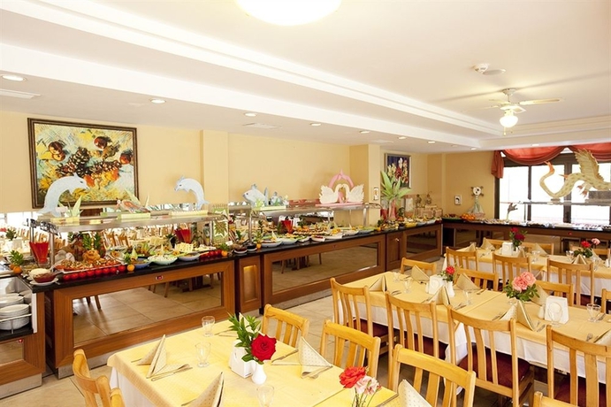 Imagen del bar/restaurante del Hotel Marbel By Palm Wings. Foto 4