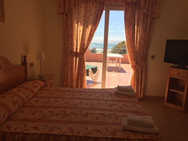 Imagen de la habitación del Hotel Marbella Beach Resort At Club Playa Real. Foto 8