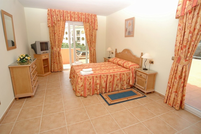 Imagen de la habitación del Hotel Marbella Beach Resort At Club Playa Real. Foto 13