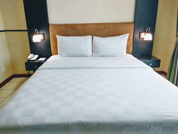 Imagen de la habitación del Hotel Marbella Suites Bandung. Foto 12