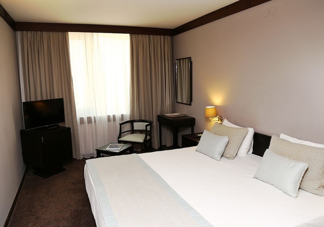 Imagen de la habitación del Hotel Marble. Foto 15